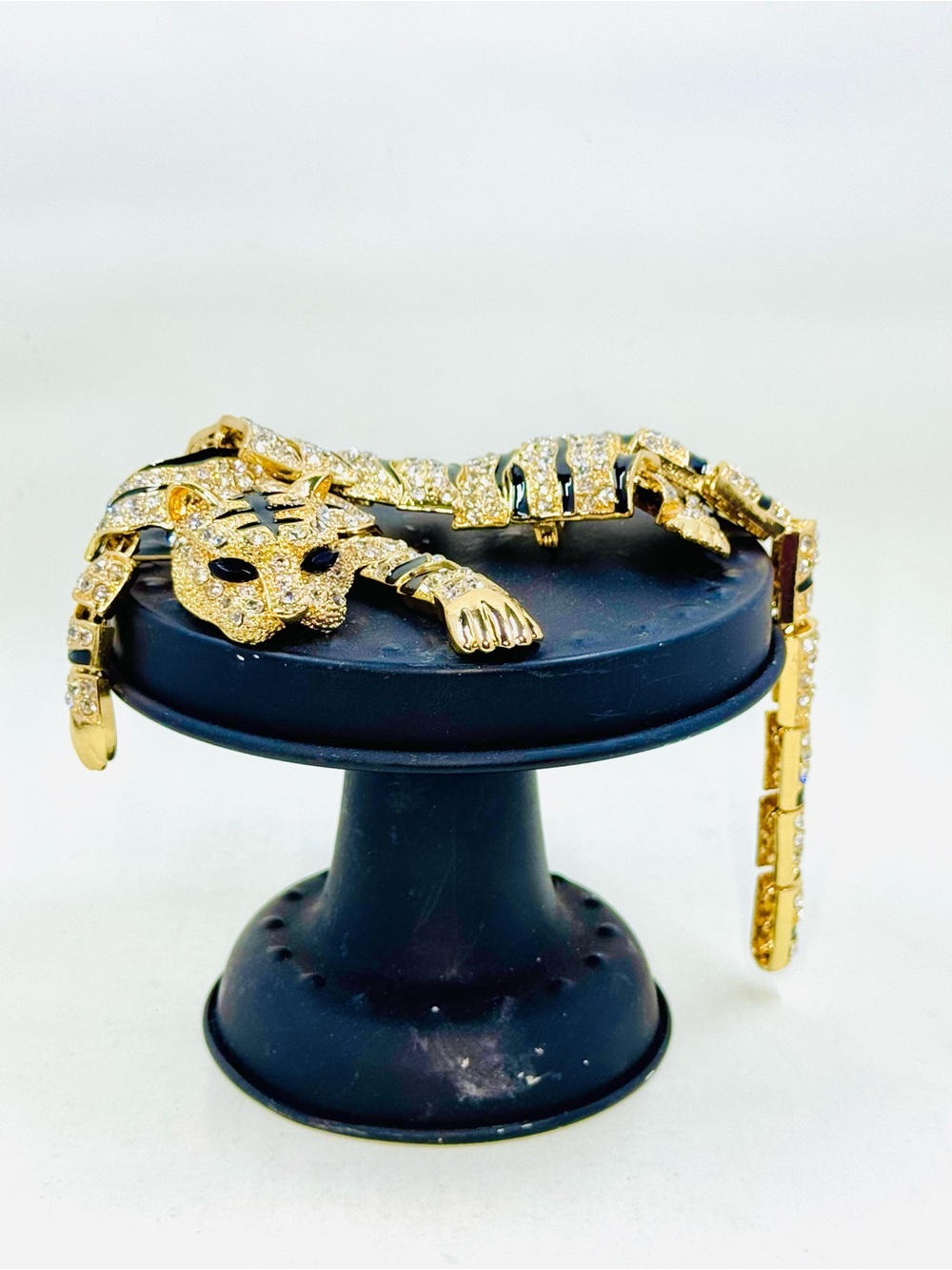 10.5” Long Gold Tone Black Enamel & Crystal Articulated Tiger Shoulder Brooch